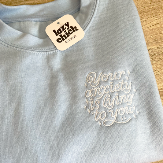 YOUR ANXIETY IS LYING TO YOU - Baby Blue Crewneck Sweatshirt